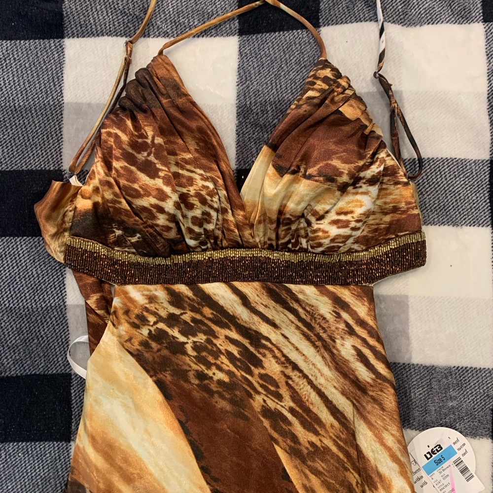 New with tags size 5 formal animal print dress.